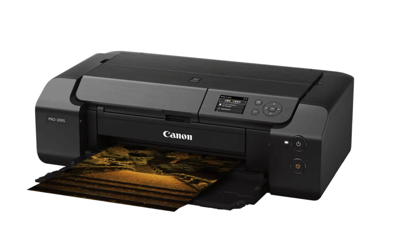 black canon pixma pro 200 photo printer producing a detailed landscape print with control panel and paper tray visible