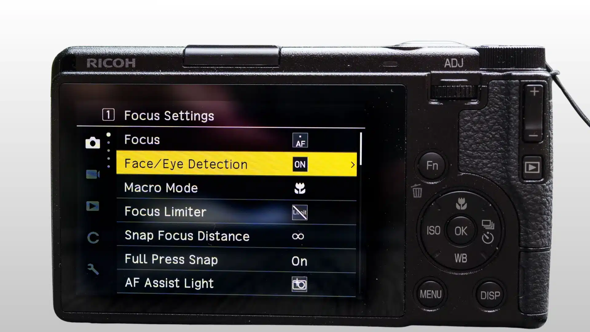 ricoh gr iv rear screen showing focus settings and face eye detection menu options